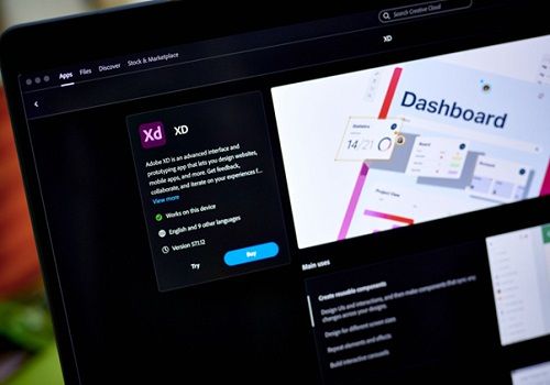 Adobe XD application open on a laptop showing a professional website dashboard design project. Adobe XD application open on a laptop showing a professional website dashboard design project.
